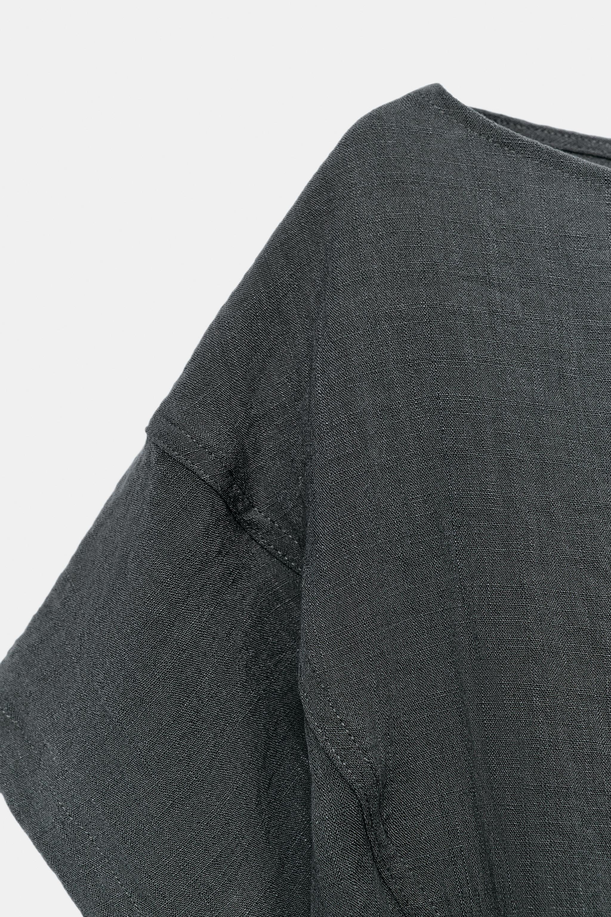 ADJUSTABLE HEM CAPE SHIRT